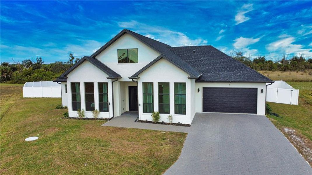 Front exterior of a new home in , Placida, FL, highlighting curb appeal (Image 25).