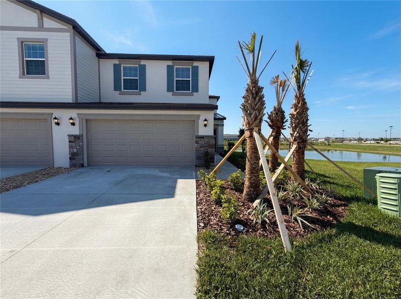Front exterior of a new home in , San Antonio, FL, highlighting curb appeal (Image 2). Front exterior of a new home in , San Antonio, FL, highlighting curb appeal (Image 2).
