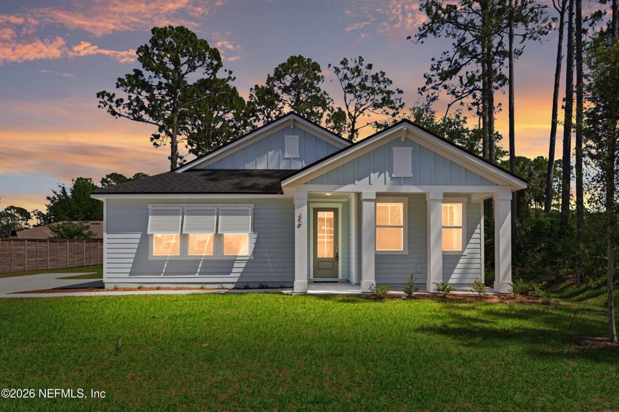 Front exterior of a new home in Palm Coast Homes, Palm Coast, FL, highlighting curb appeal (Image 29).