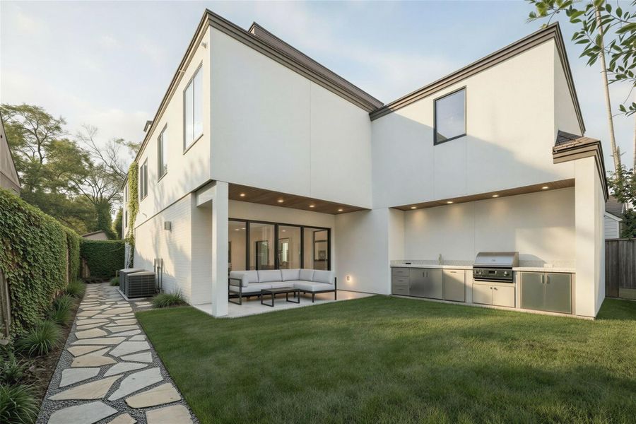 Rendering: Backyard with summer kitchen and patio.