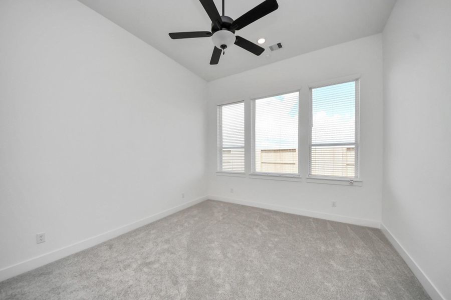 Spacious, unfurnished interior of a new home in Meridiana Courtyard Collection, Manvel (Image 26).