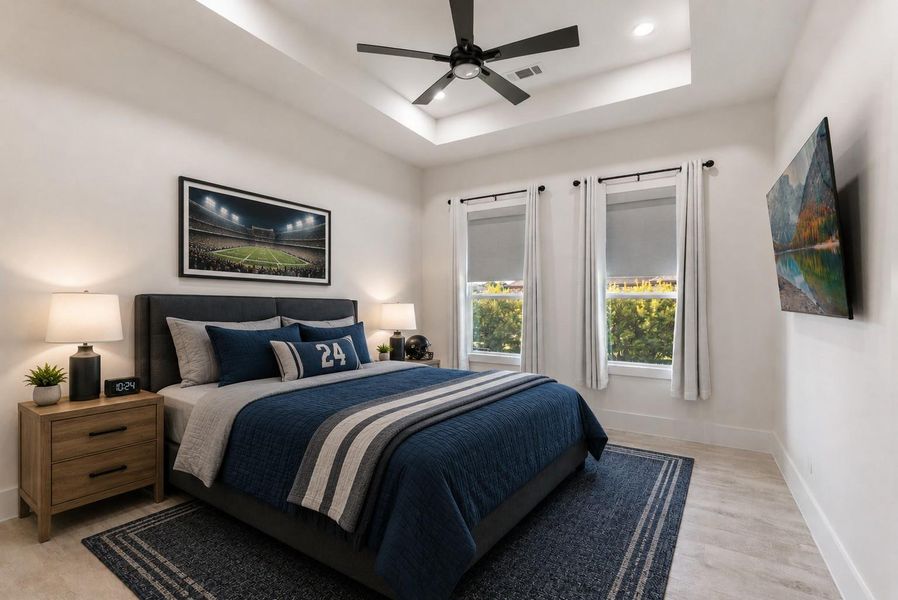 Bedroom 2 offers a large black ceiling fan, tray ceiling and 2 large windows. Bedroom 2 offers a large black ceiling fan, tray ceiling and 2 large windows.