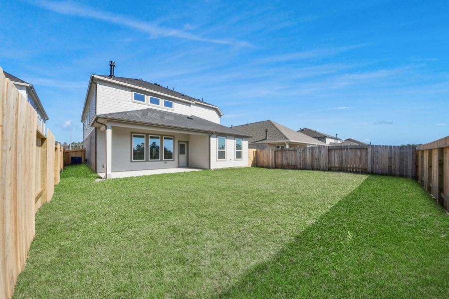 Come and see this spacious backyard with its beautiful covered patio. There is plenty of room for the kids to play and adults to relax. Perfect for your outdoor living space, patio furniture, bbq pit, and so much more. The possibilities are endless!