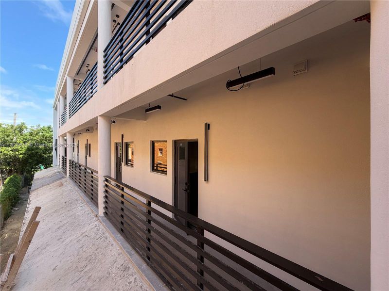 Exterior details and patio area of a home in , Miami (Image 3). Exterior details and patio area of a home in , Miami (Image 3).