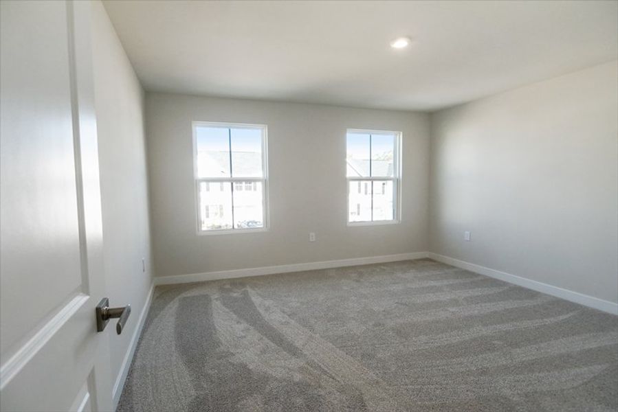 Spacious, unfurnished interior of a new home in Arden Woods Villas, Greenville (Image 15).