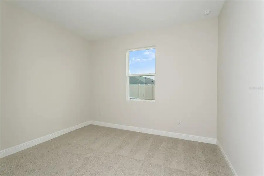 Spacious, unfurnished interior of a new home in Pasadena Woods, Dade City (Image 13).