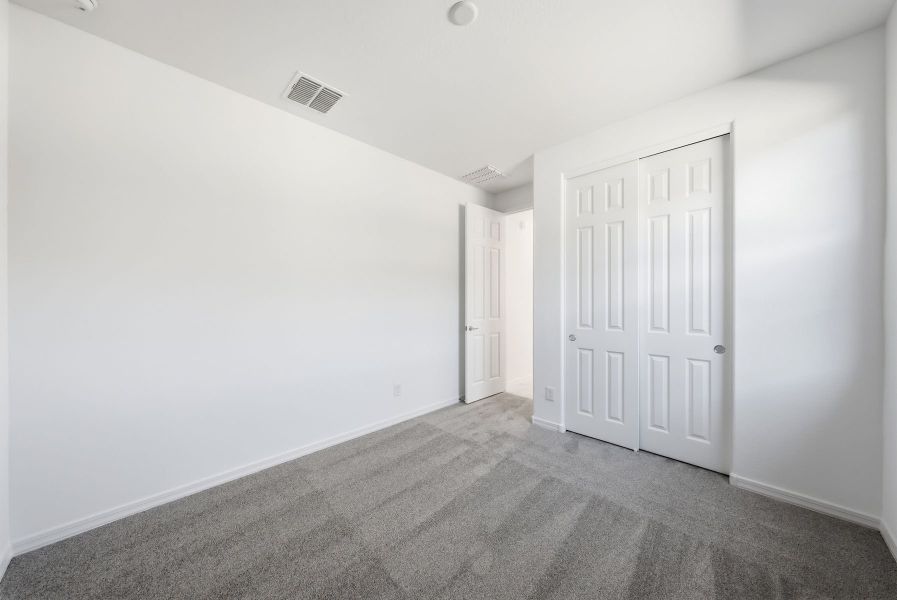 Spacious, unfurnished interior of a new home in Empire Pointe, Queen Creek (Image 14).