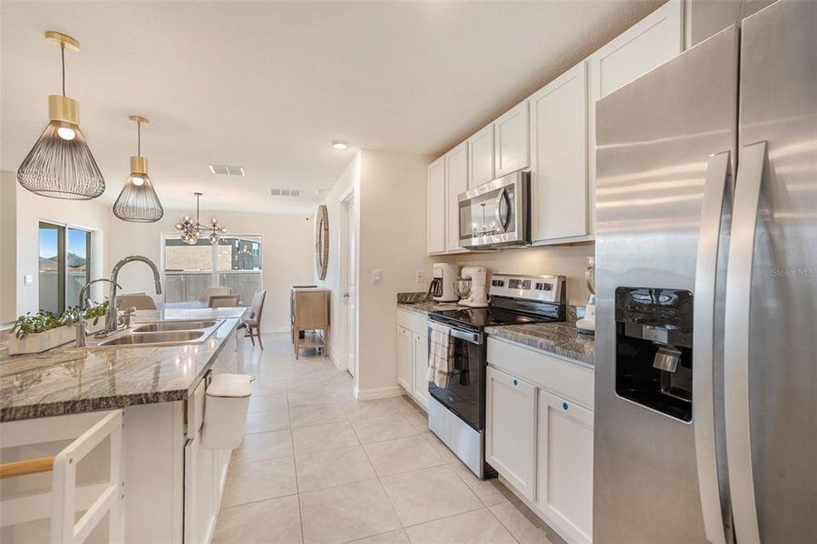 Furnished interior view inside a new home in Bella Lago, Parrish (Image 5).