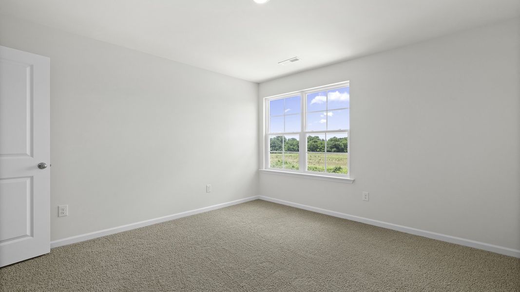 Spacious, unfurnished interior of a new home in The Landing at Summerhaven, Mebane (Image 14).