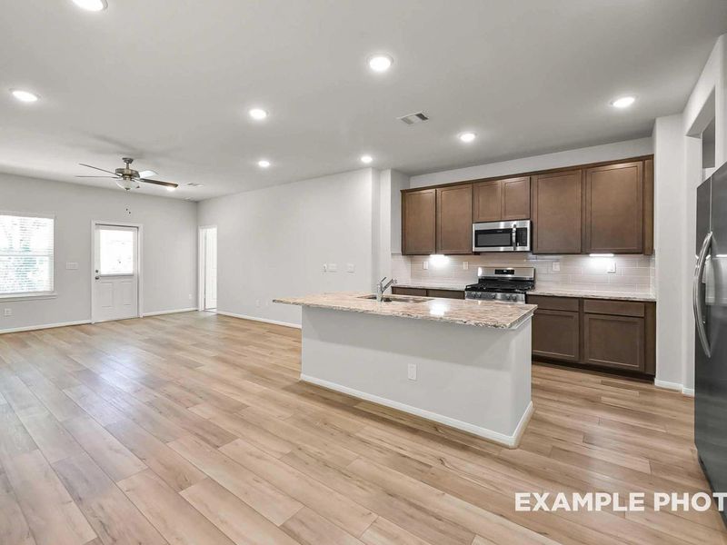 Furnished interior view inside a new home in Caney Creek Place, Conroe (Image 4).