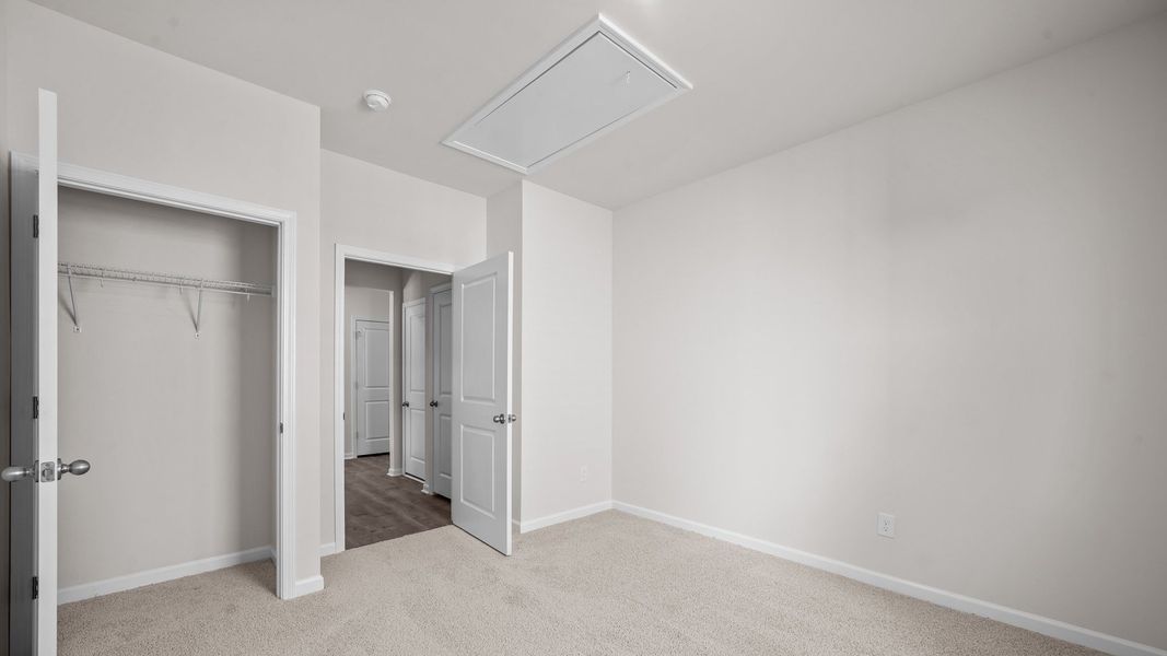 Spacious, unfurnished interior of a new home in Ridgewood Farms, Winterville (Image 21).