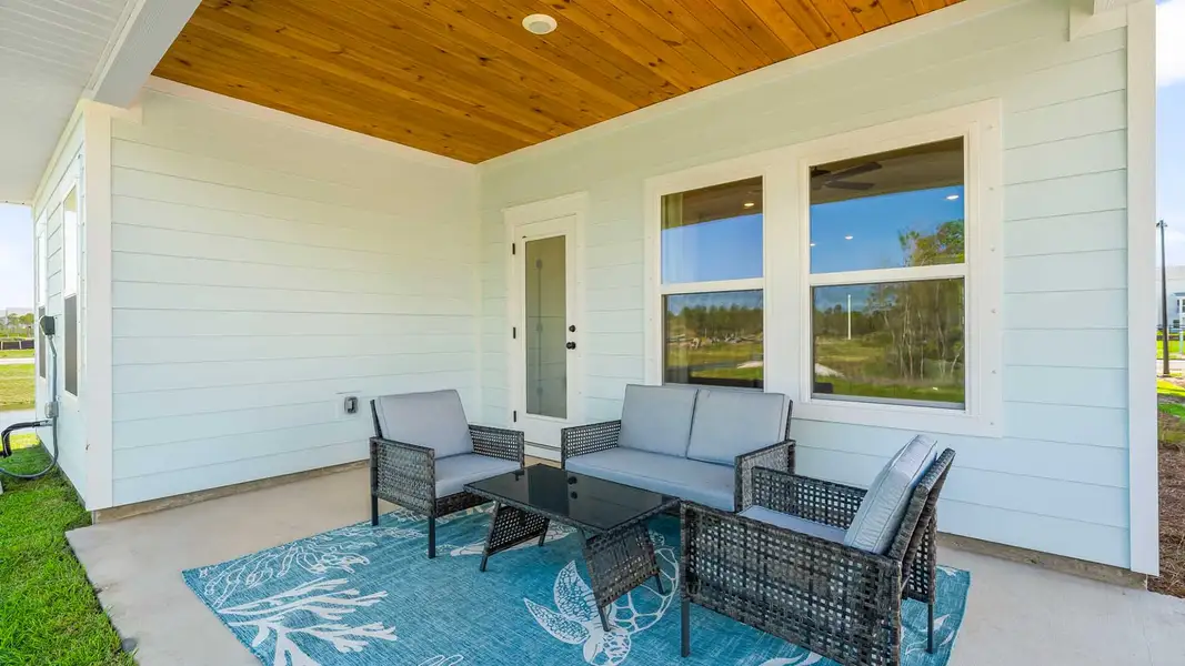 Exterior details and patio area of a home in Colonial East, Panama City Beach (Image 2). Exterior details and patio area of a home in Colonial East, Panama City Beach (Image 2).