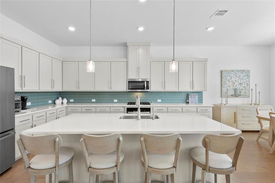 Furnished interior view inside a new home in North Square at Uptown, Celina (Image 29).