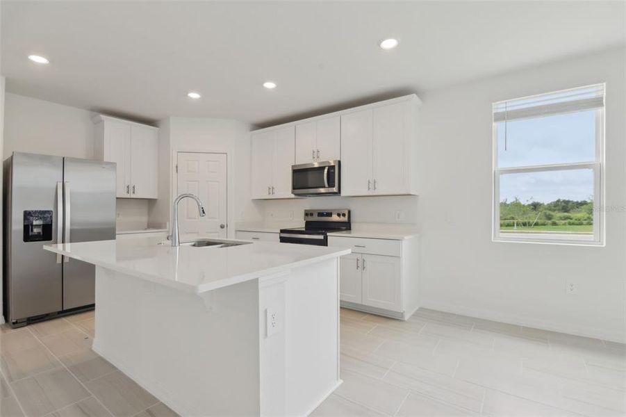 Furnished interior view inside a new home in Springs at Lake Alfred - Signature Series, Lake Alfred (Image 13).