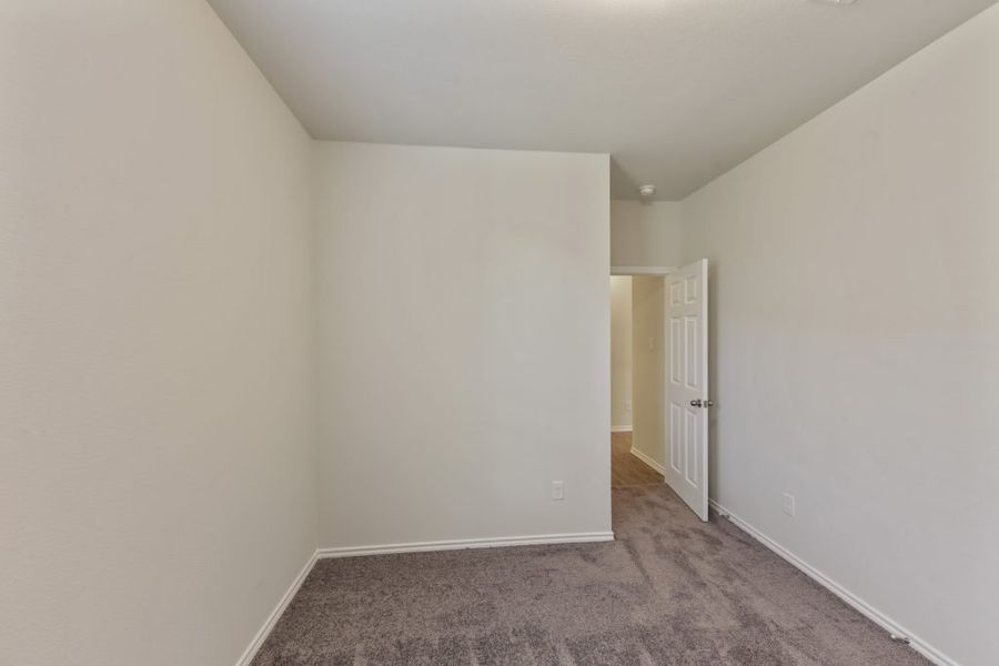 Representative exterior photo of a completed home built from the Cameron by Impression Homes in Heartland, Heartland, TX (Image 20).