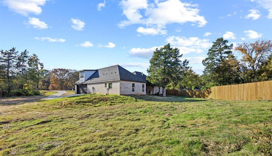 Exterior details and patio area of a home in , Denison (Image 31). Exterior details and patio area of a home in , Denison (Image 31).