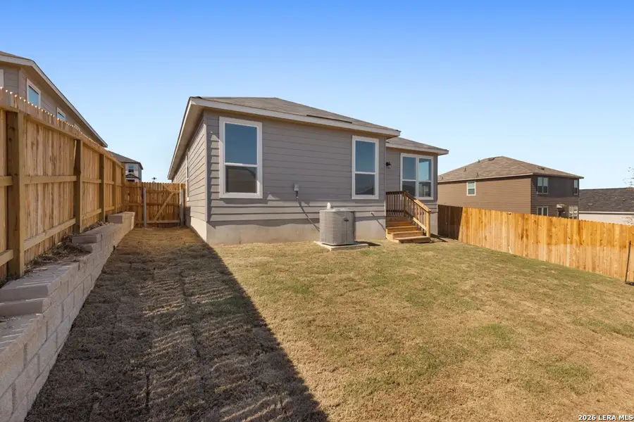 Exterior details and patio area of a home in Knox Ridge, Converse (Image 4).