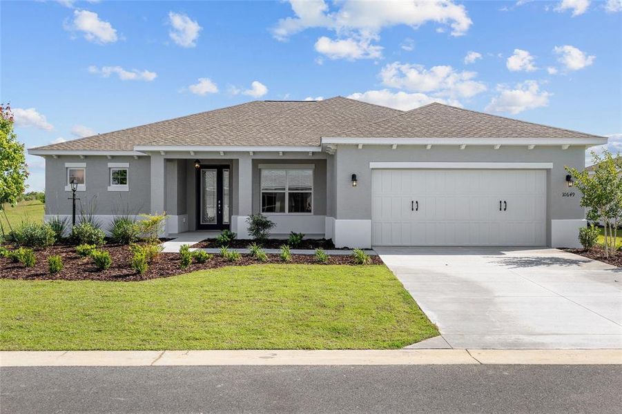 Front exterior of a new home in , Ocala, FL, highlighting curb appeal (Image 20). Front exterior of a new home in , Ocala, FL, highlighting curb appeal (Image 20).