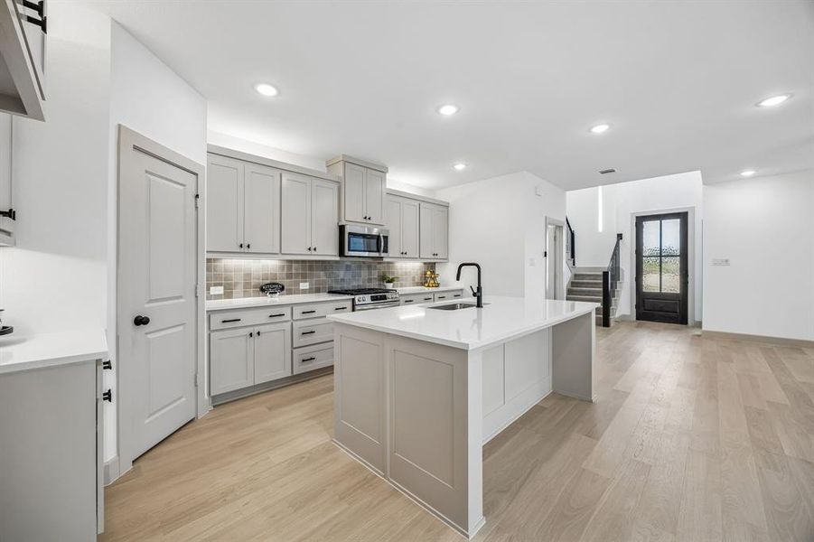The chef in the family will never be left out of the party in this fantastic floor plan!