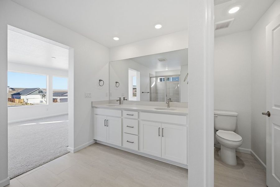 Furnished interior view inside a new home in Trailstone, Arvada (Image 9).