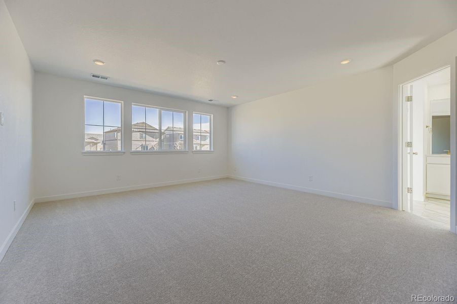 Spacious, unfurnished interior of a new home in Newlin Crossing: The Monarch Collection, Parker (Image 13). Spacious, unfurnished interior of a new home in Newlin Crossing: The Monarch Collection, Parker (Image 13).