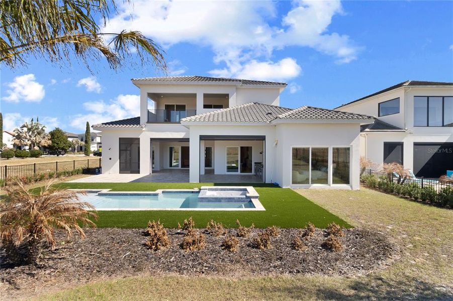 Exterior details and patio area of a home in Bella Collina, Montverde (Image 22).