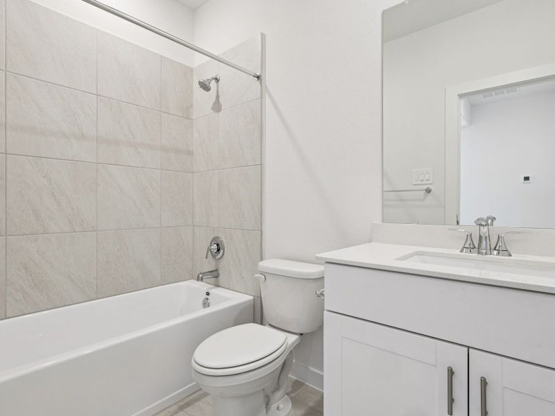 Furnished interior view inside a new home in Spring Brook Village - City Series, Houston (Image 9).