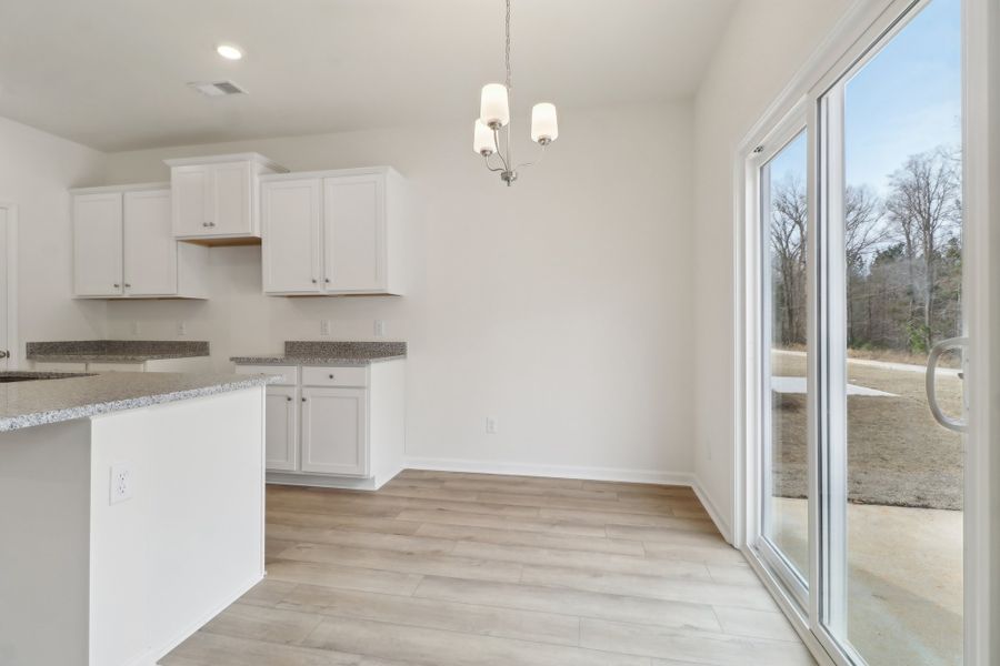 Representative furnished interior of a home built from the Hidden Creek II by Great Southern Homes in Worthington, Hephzibah (Image 8).