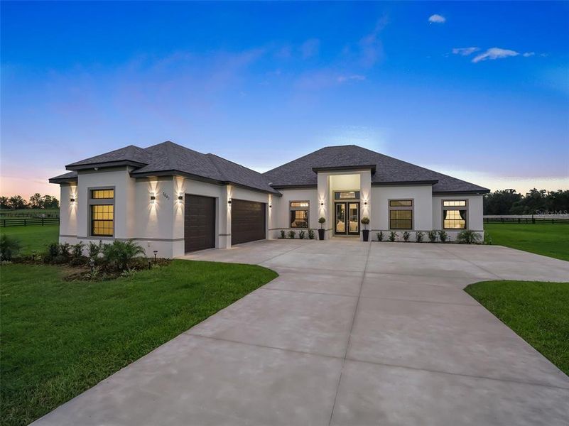 Front exterior of a new home in , Ocala, FL, highlighting curb appeal (Image 2).
