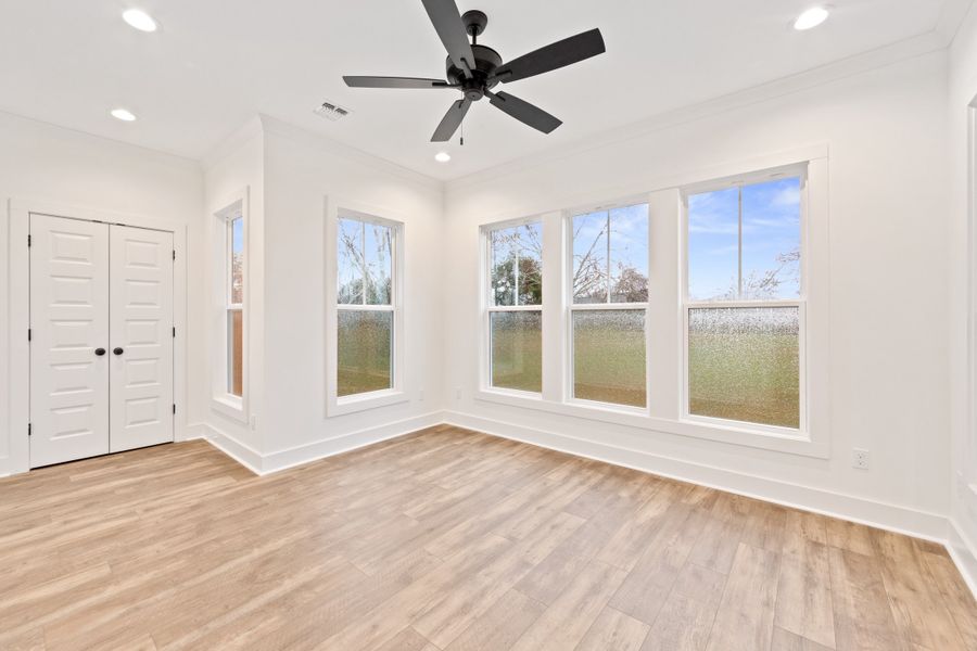 Representative unfurnished interior of a home built from the The Charlotte by Manuel Builders in Chapel Bend, Montgomery (Image 26).