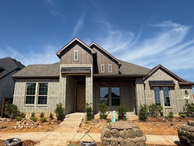 Front exterior of a new home in Karis, Crowley, TX, highlighting curb appeal (Image 1). Front exterior of a new home in Karis, Crowley, TX, highlighting curb appeal (Image 1).