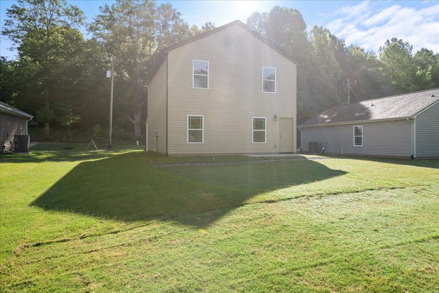 Representative exterior photo of a completed home built from the Riley by Enchanted Homes in Gentry Place, Spartanburg, SC (Image 15).
