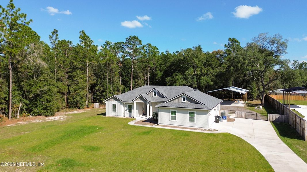 Front exterior of a new home in , Keystone Heights, FL, highlighting curb appeal (Image 2). Front exterior of a new home in , Keystone Heights, FL, highlighting curb appeal (Image 2).