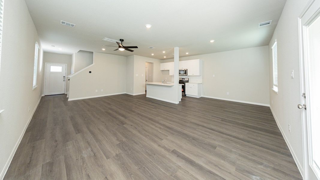 Family Room to Dining Area and Kitchen Family Room to Dining Area and Kitchen