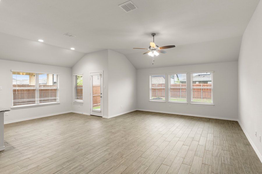 Representative exterior photo of a completed home built from the Cheyenne by Impression Homes in DeBerry Reserve, Royse City, TX (Image 11).