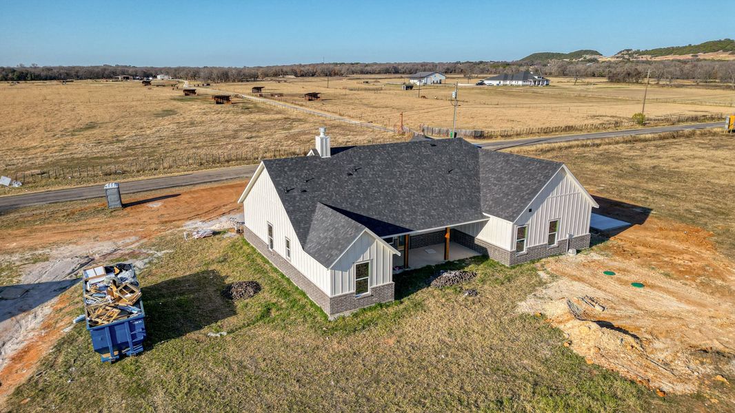 Representative exterior photo of a completed home built from the Jarrett 2 by Zeal Home Builders in Sunrise Point, Weatherford, TX (Image 23).