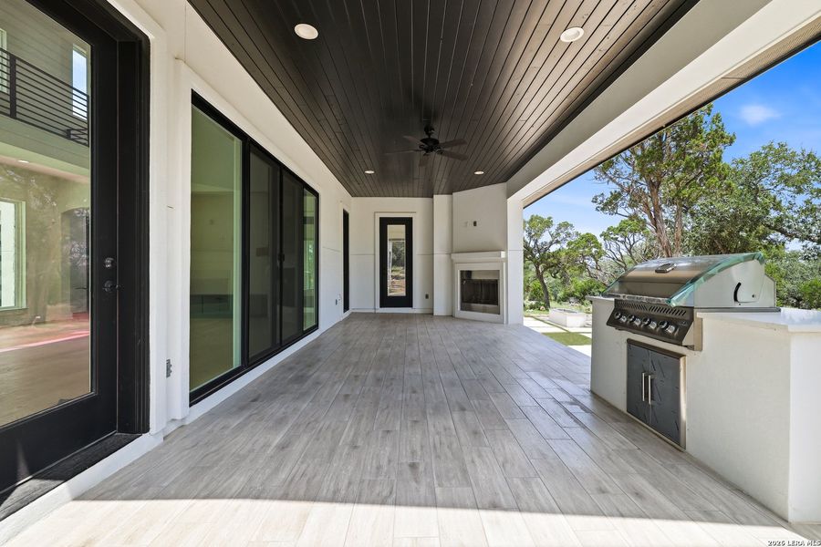 Exterior details and patio area of a home in , New Braunfels (Image 52).