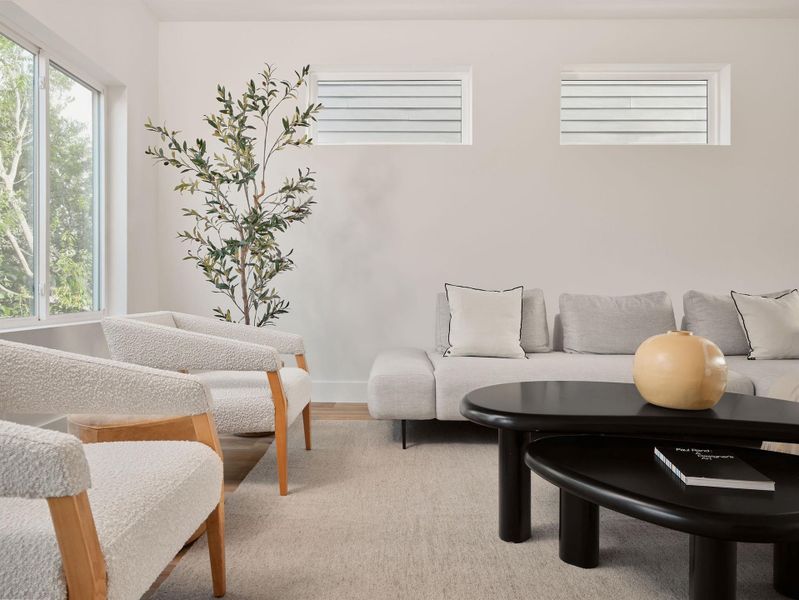 Living area featuring wood finished floors and baseboards