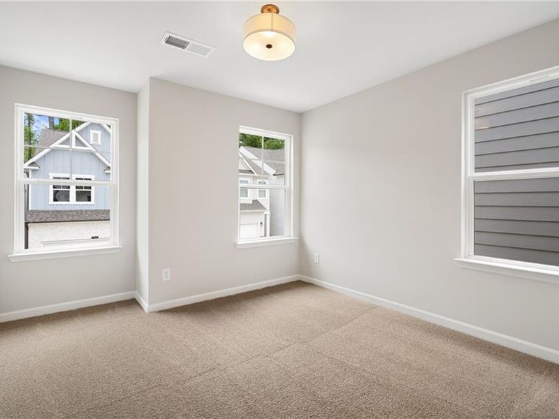 Spacious, unfurnished interior of a new home in The Village at Shallowford, Kennesaw (Image 25).
