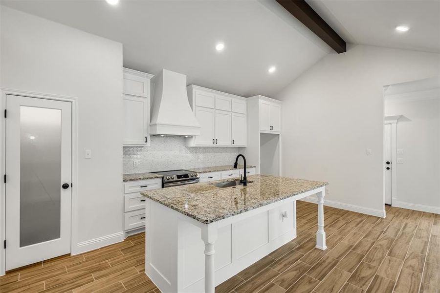 Custom Kitchen with large granite island!