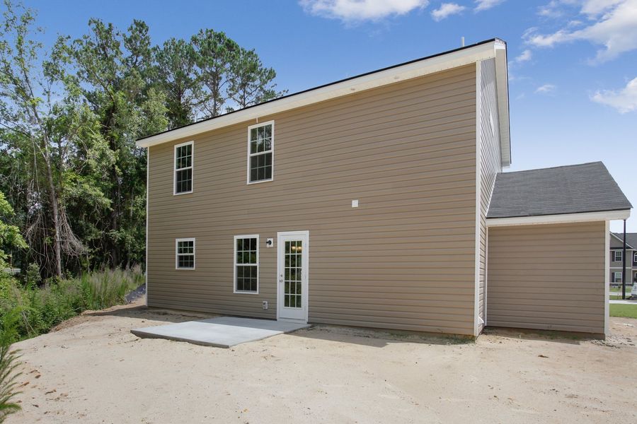 Representative exterior photo of a completed home built from the The Pamona by RTS Homes in Grand Reserve, Hinesville, GA (Image 18).
