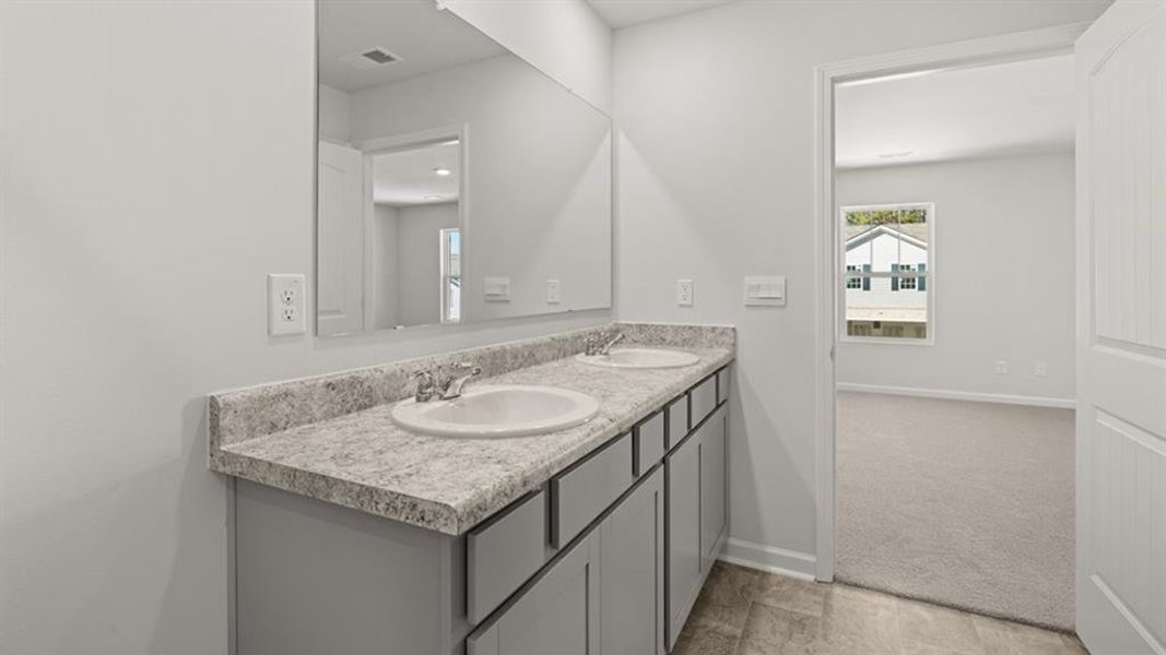 Furnished interior view inside a new home in Oaks at Cedar Grove, Fairburn (Image 10).