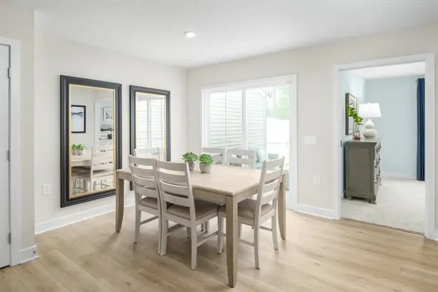 Representative furnished interior of a home built from the Nassau Cove - 3253 Edgehill Drive by Ryan Homes in Lakes at Riverbend, Navassa (Image 7).