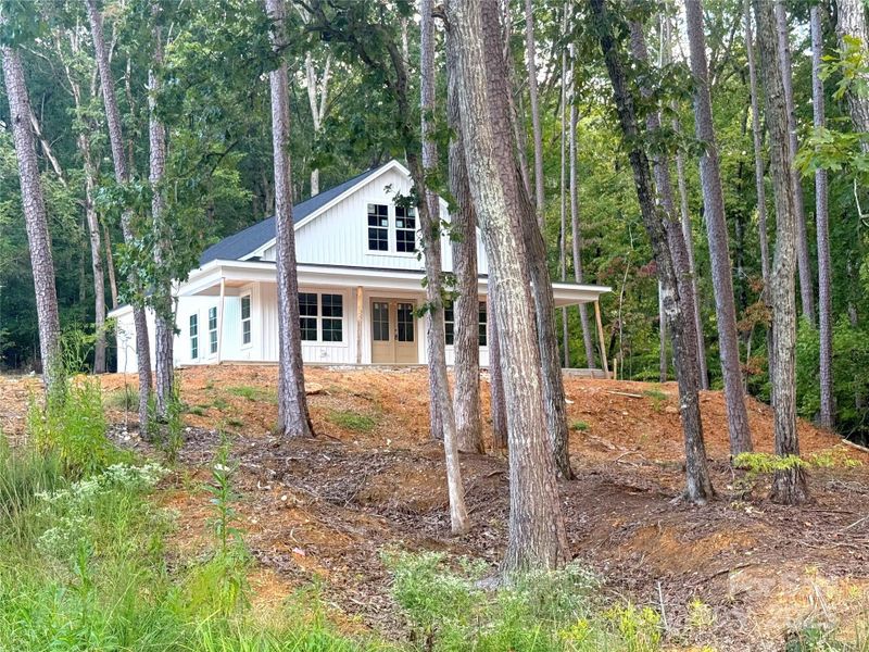 Front exterior of a new home in , Mount Gilead, NC, highlighting curb appeal (Image 11).