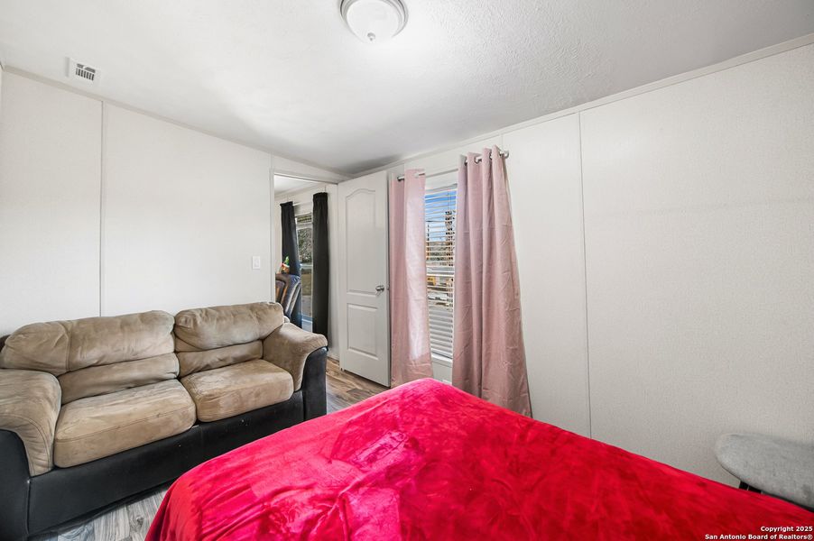 Furnished interior view inside a new home in , Elmendorf (Image 10).
