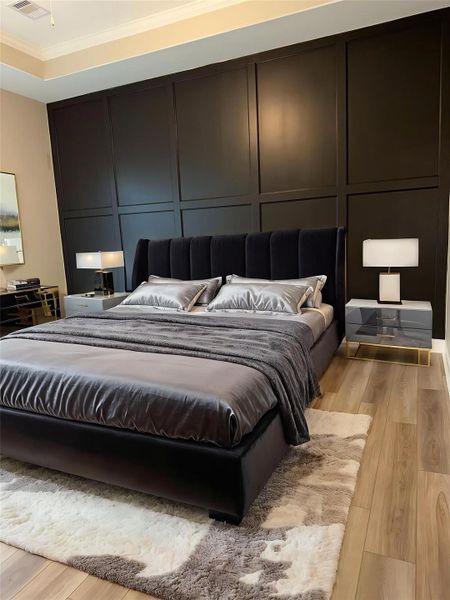 Discover the epitome of luxury and tranquility in the Portico's primary bedroom at Winfrey Estates. This elegant retreat features spacious interiors, exquisite finishes, and a serene ambiance providing the perfect sanctuary. *Image depicts home as-is virtually staged.