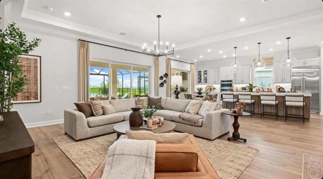 Furnished interior view inside a new home in Esplanade at Wellen Park, Englewood (Image 6).