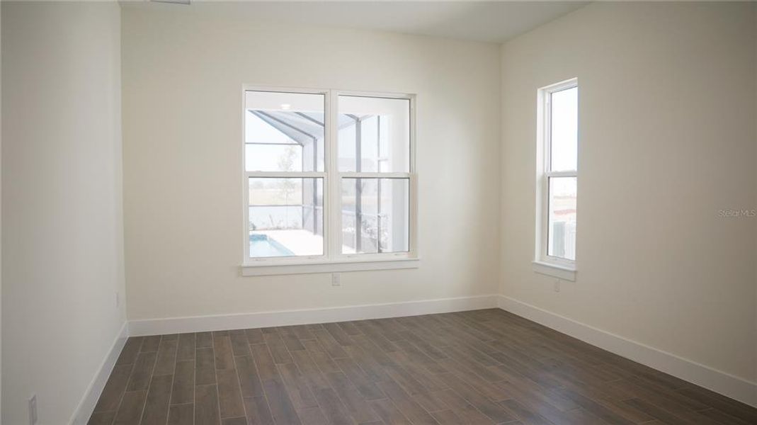 Spacious, unfurnished interior of a new home in Gracewater at Sarasota, Sarasota (Image 11).