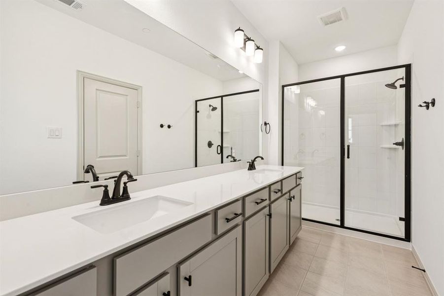 You'll find a spacious walk in shower calling your name in this fantastic owner's bath!