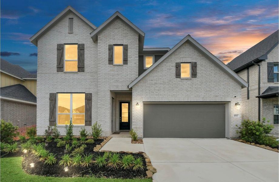 Front exterior of a new home in Cross Creek West: Richmond Collection, Fulshear, TX, highlighting curb appeal (Image 1).